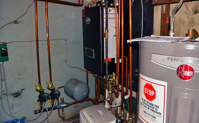 https://tappinghotwater.com.au/uploads/2025/06/electric-hot-water-system-58729.jpg