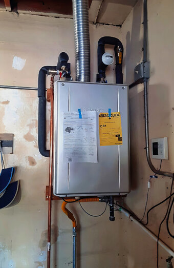 https://tappinghotwater.com.au/uploads/2025/06/instant-hot-water-systems-51476.jpg