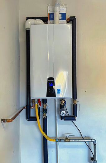 https://tappinghotwater.com.au/uploads/2025/06/instant-hot-water-systems-63860.jpg